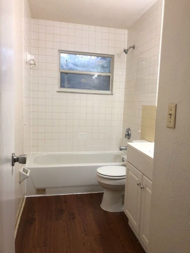 Building Photo - SPACIOUS 3BR/1.5BA w/Carport, Beautiful Wood Finish Flooring, Privacy Fenced Backyard! NO APP FEE!