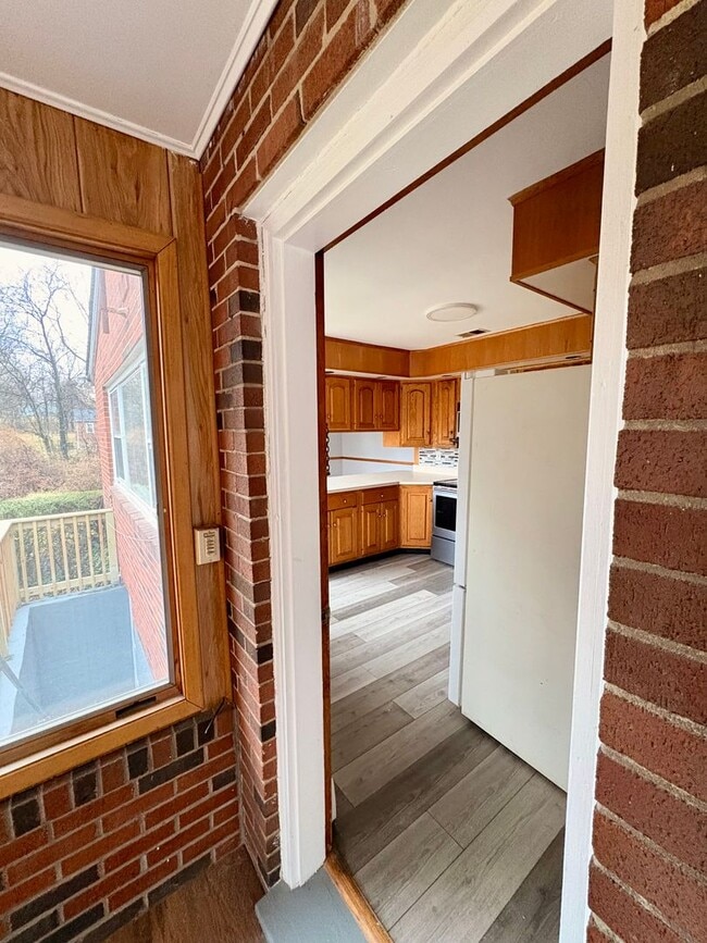 Building Photo - Sprawling Brick Ranch with Huge Lot & Garage in Prime Nottingham Location