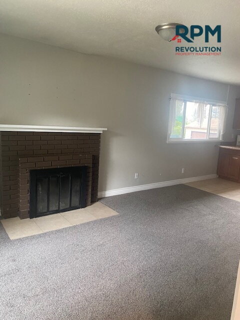 Foto del edificio - "Charming 4-Bed, 2-Bath Gem in Ogden"