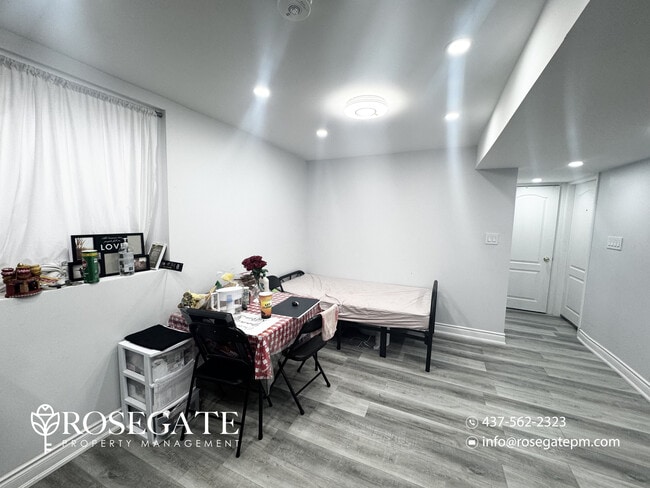 Photo du bâtiment - Bright 1 Bedroom + Den (Usable as 2nd Bedroom) Basement Apartment with Parking