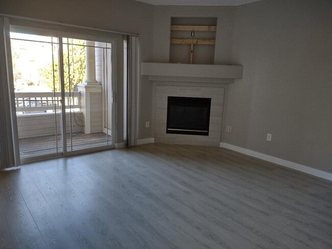 living room w/deck and fireplace - 8318 S Independence Cir