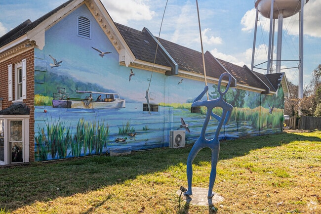 A wall mural off Main Street gives the area a taste of things that represent its river run area.