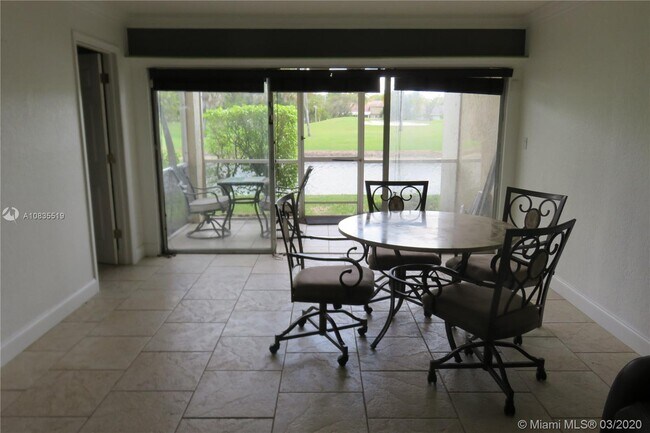 Building Photo - 7460  Woodmont  102 Tamarac Fl 33321
