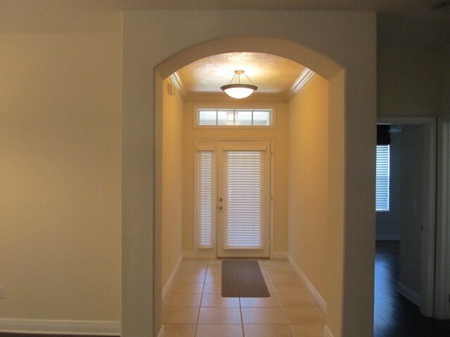 Building Photo - PRISTINE 3/2 one story home in gated commu...