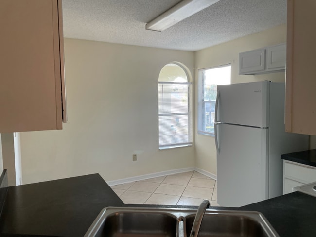 Building Photo - 3211 Sabal Palms Ct