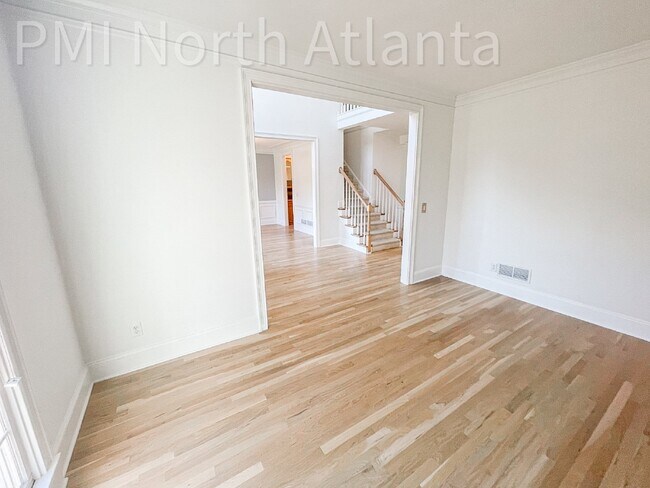 Building Photo - Pet Friendly, with a Fenced-in Backyard.