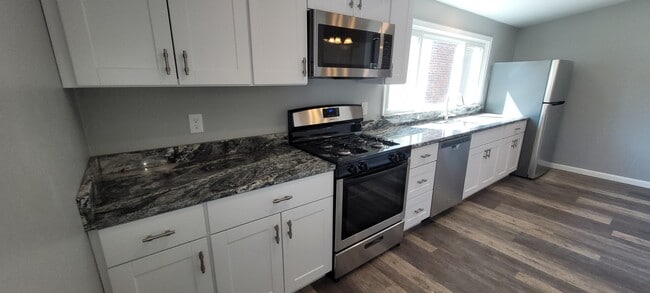 Full kitchen with tons of counter space - 220 Prospect Ave