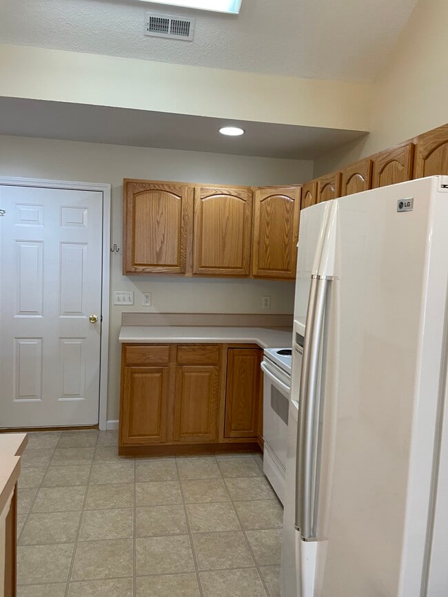 Kitchen with door to garage - 3553 Oak Villa Way