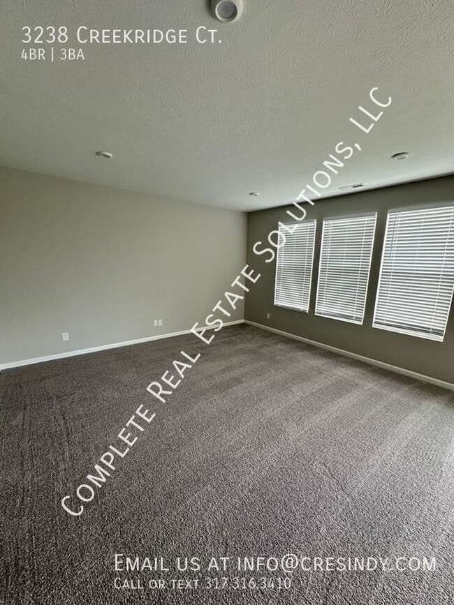 Building Photo - Now Showing this 4 BR, 2 1/2 BA home locat...