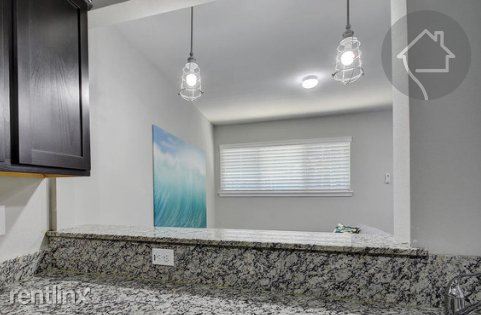 Foto del edificio - 4719 Harmon Ave