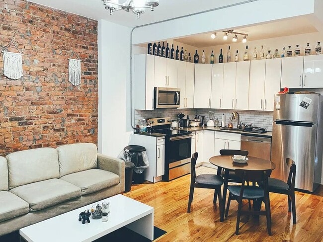 Photo - Central AC, washer/dryer, Exposed Brick Room #214 Apartment