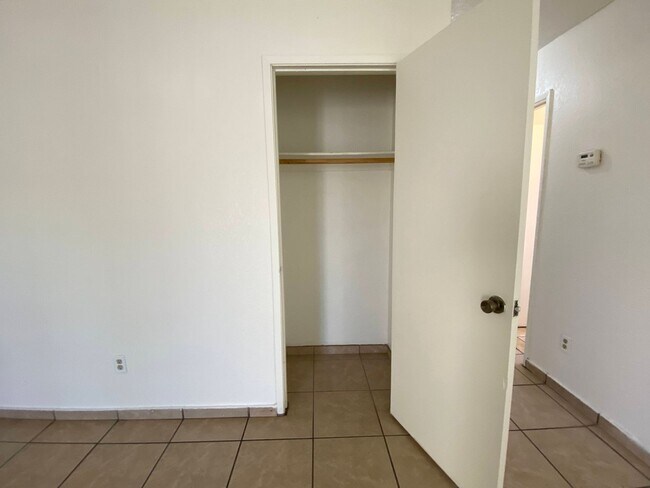 Building Photo - Price Reduced!! Two Bed, One Bath Triplex with a One Car Garage In North Stockton