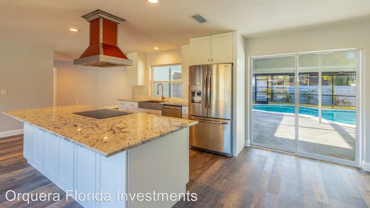 Foto principal - 4 br, 3 bath House - 4414 Riverwood Ave