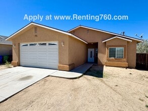 Building Photo - 7090 Plasse St
