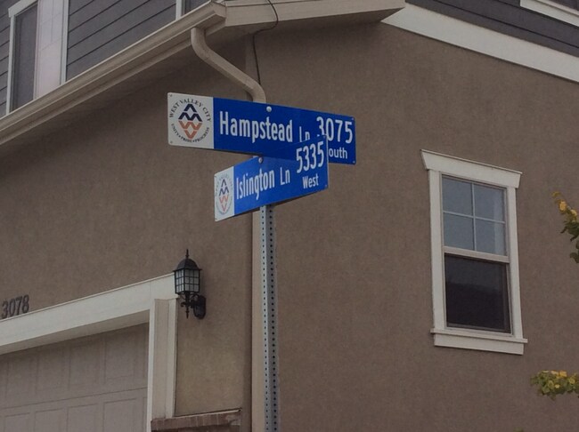 Building Photo - Spacious 4-Bedroom Townhouse Oasis in West Valley City!