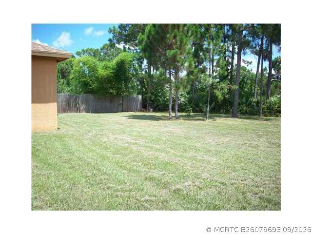 Foto del edificio - 6173 NW E Deville Cir