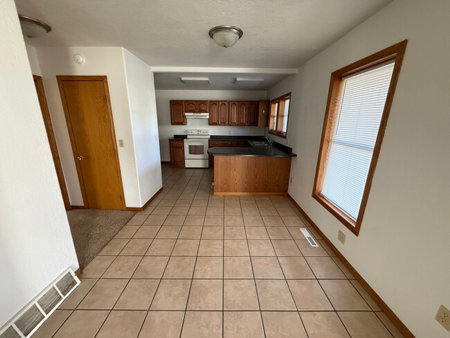 Foto del edificio - 403 W 3rd St