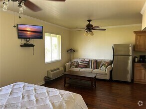Building Photo - 25000 Tamiami Trl E