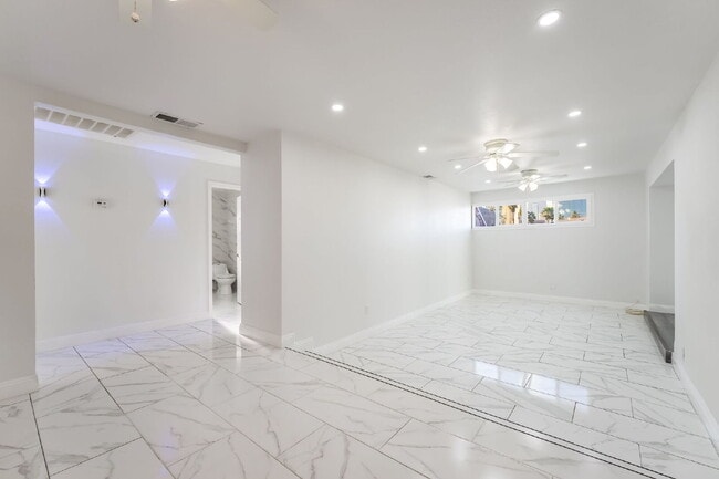 Building Photo - Single Story,  Totally Renovated , 3 bedroom, 2 bathroom Home with  extensive privacy and gated h...