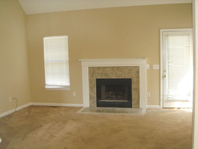 Photo - Student friendly! Large 5 BR, near WB and UNCW fireplace, 2 car garage , deck House