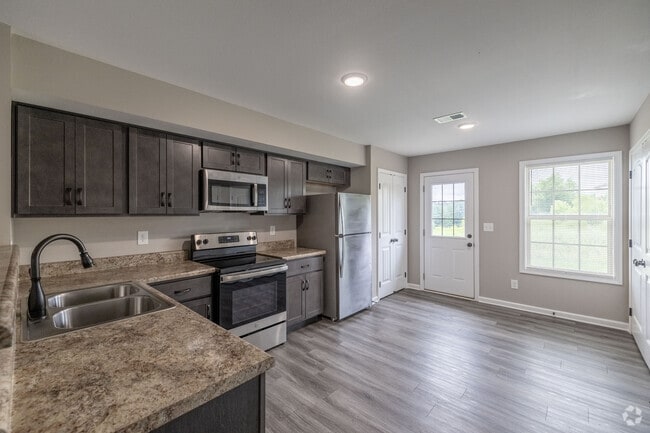 2BR, 2.5BA - 1,005SF - Kitchen - Chalet Village Townhomes