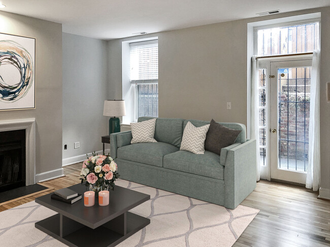 Family room with view of the terrace - lots of light! - The Logan School Condominium