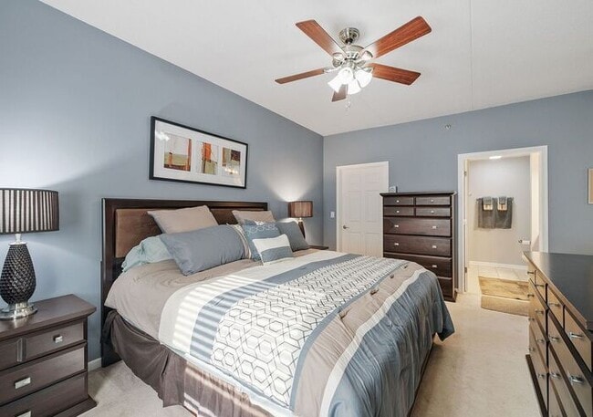 Building Photo - Bright & Spacious 2BR/2BA Condo with Cover...
