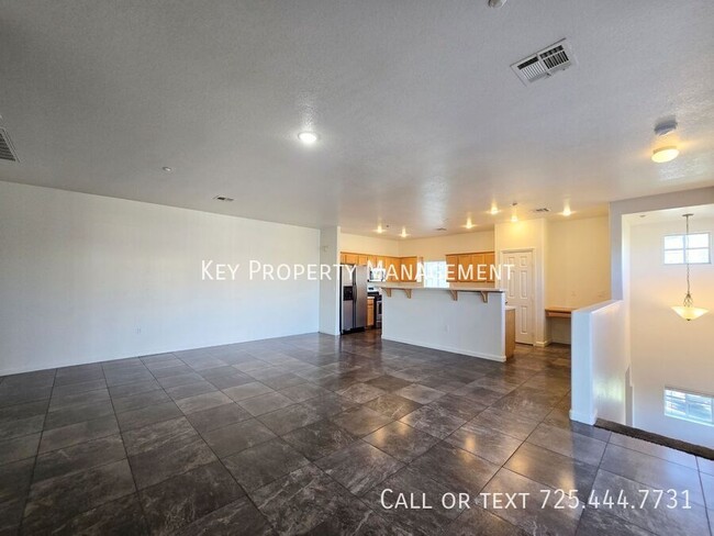 Building Photo - OPEN AND INVITING 3/BED 3/BATH TOWNHOME IN...