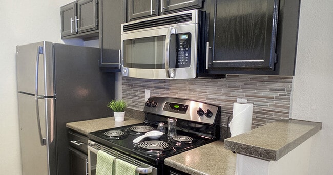 Building Photo - The Versailles Apartments
