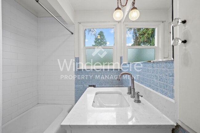 Building Photo - Great Shadle Home With Fenced Yard and Det...