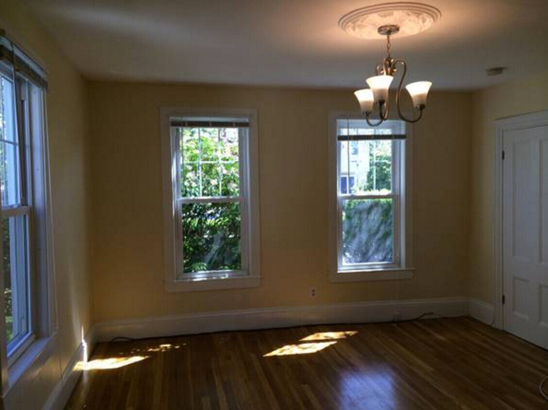 large living room with chandelier - 265 Common St