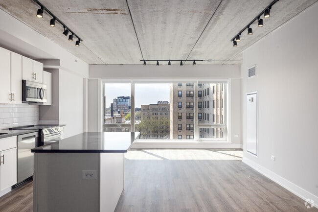 2BR, 2BA - 1,300SF - Living Room - The Carmen