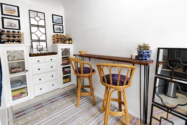 bar area stocked with games - 1659 W 36th Pl