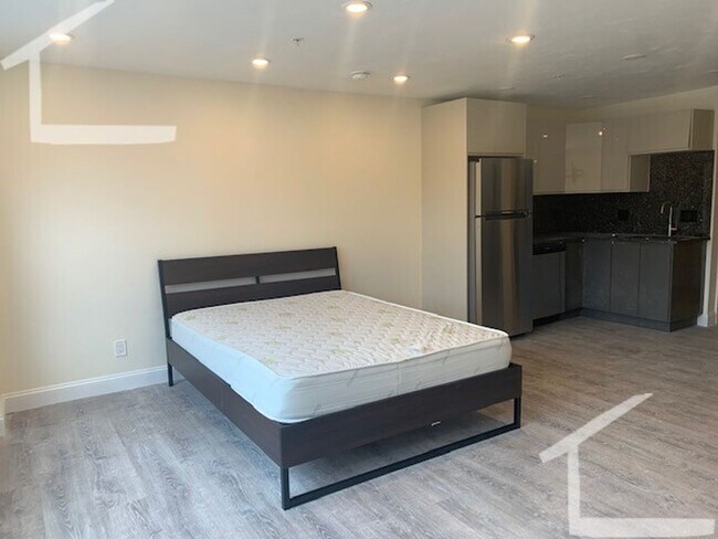 Building Photo - Loft-style open layout Studio/1BR apartmen...