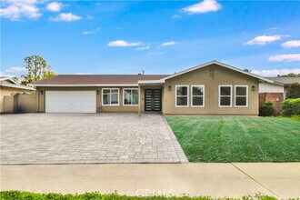 Building Photo - 9752 Laramie Ave