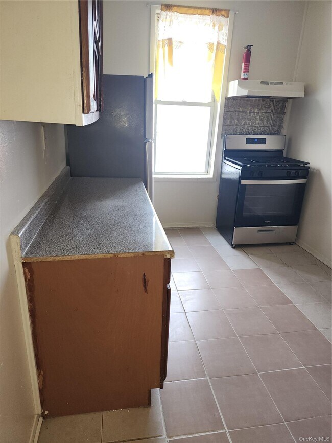 Foto del edificio - 205-11 Hollis Ave