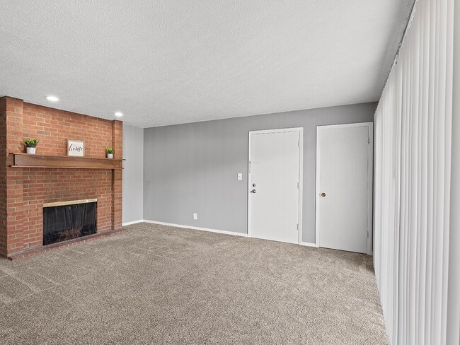 Brick Fireplace in Select Homes - Forest Park Apartments