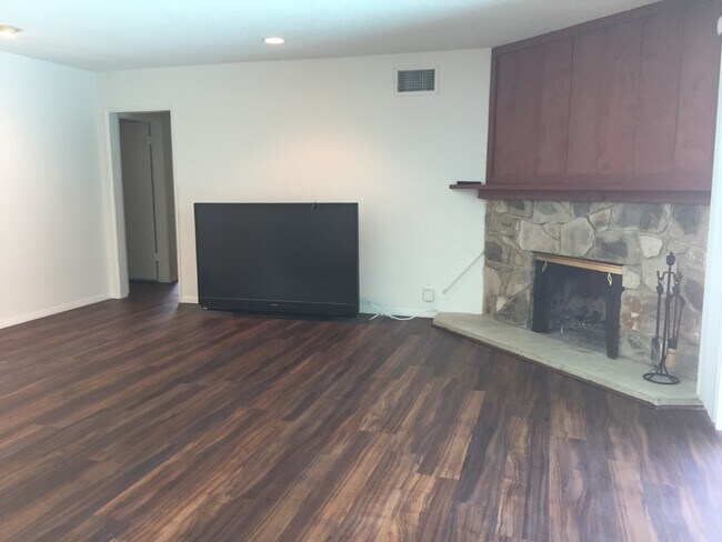 Living Room w/Fireplace - 6720 Capistrano Ave