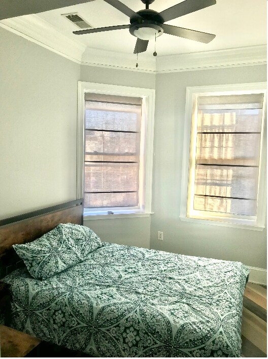 Master Bedroom with Queen-sized bed and direct access to bathroom. - 500 Irving St NW