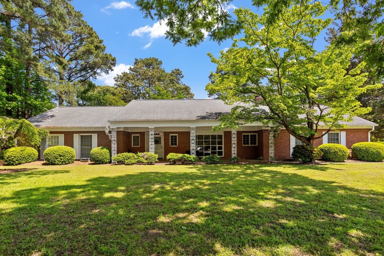 Primary Photo - Beautiful brick home on a 1-acre lakefront...