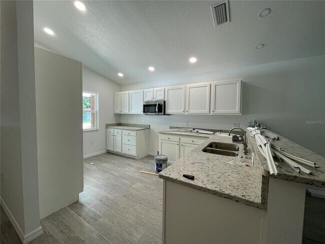 Foto del edificio - 8884 E Ogden Ln