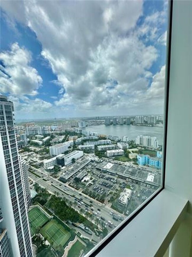 Building Photo - 18201 Collins Ave