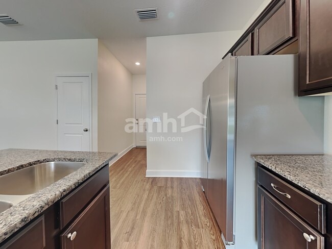 Building Photo - 6609 Hidden Rose Pl