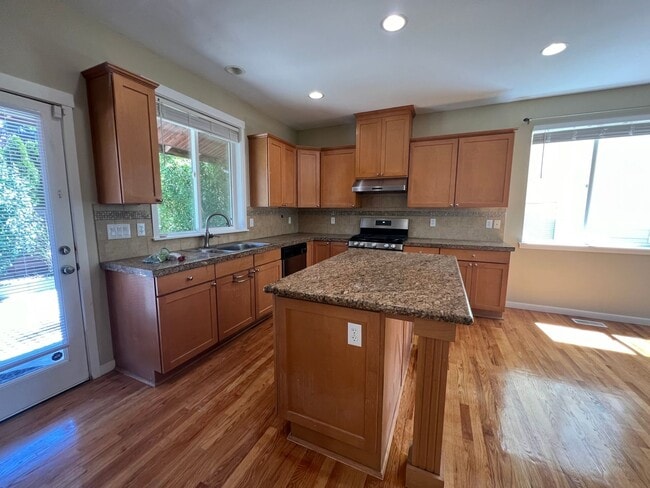 Building Photo - Spacious 4 Bedroom Home with Zen Backyard and 3-Car Garage
