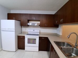 Building Photo - 100 NW 76th Ave