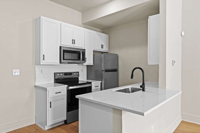 Foto del edificio - Live in Style – 1BR Townhouse in McKinley ...