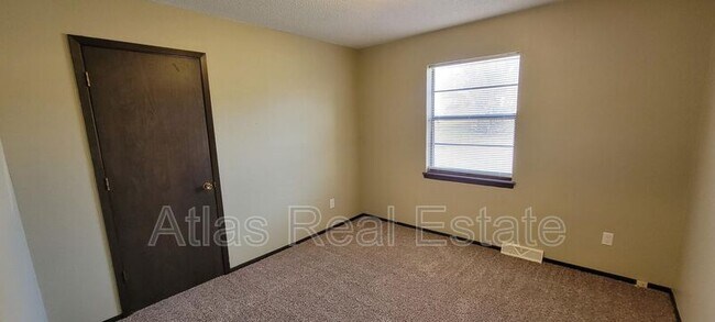 Building Photo - 17305-17307 East 48th St Ct S