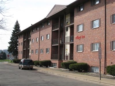 Building Photo - Village Inn Apartments