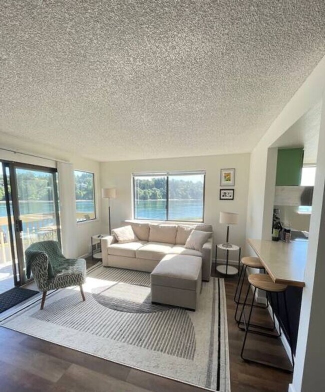 Building Photo - Waterfront Living Made Easy – Furnished 1-...