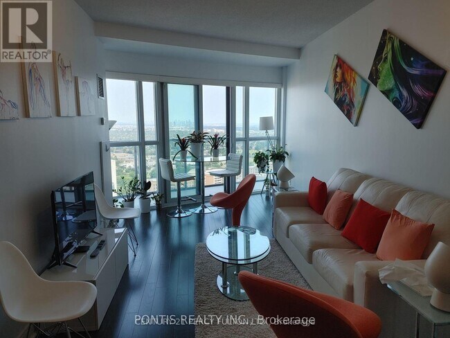Photo du bâtiment - 60-3460 Absolute Ave